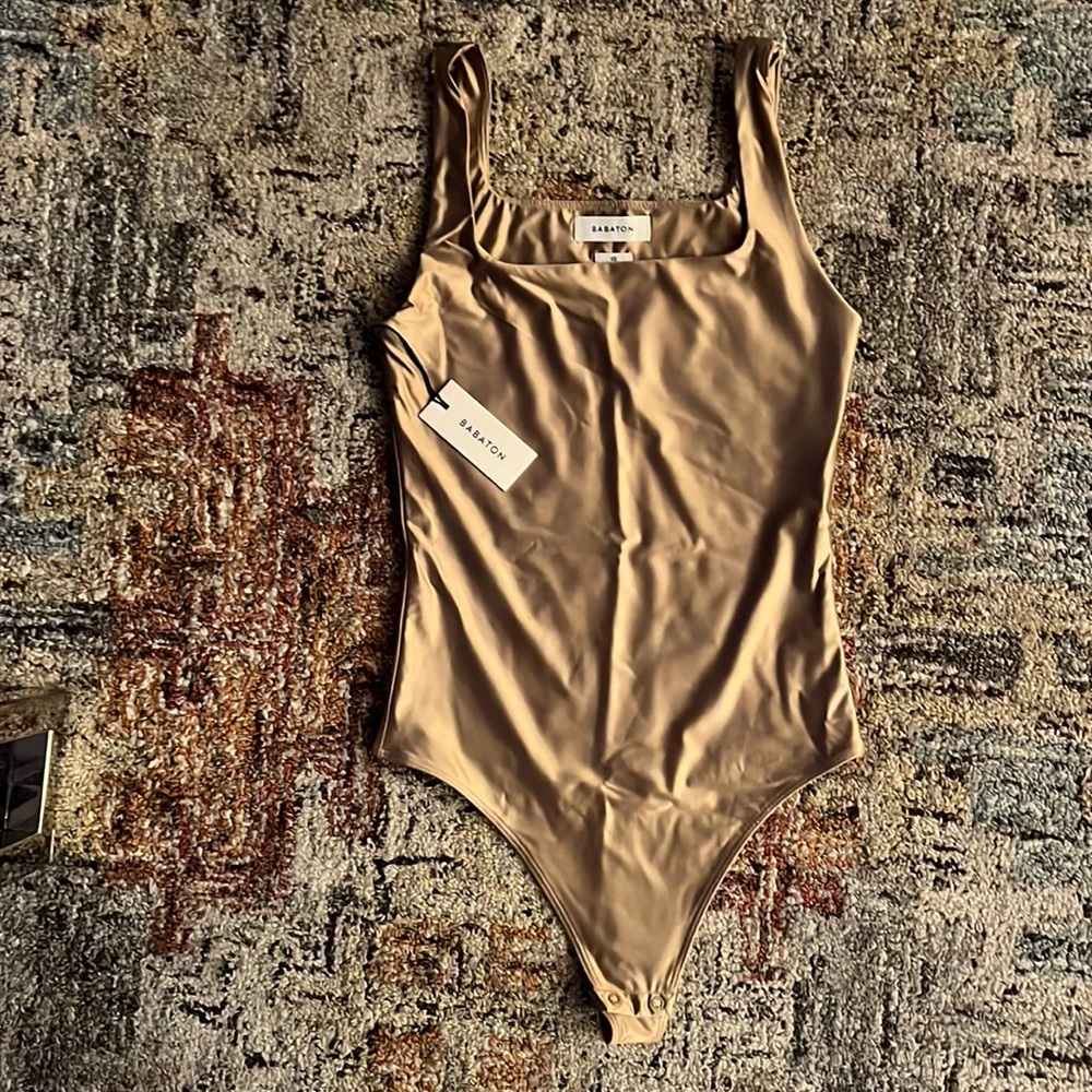 Aritzia New with tags satin gold body suite.